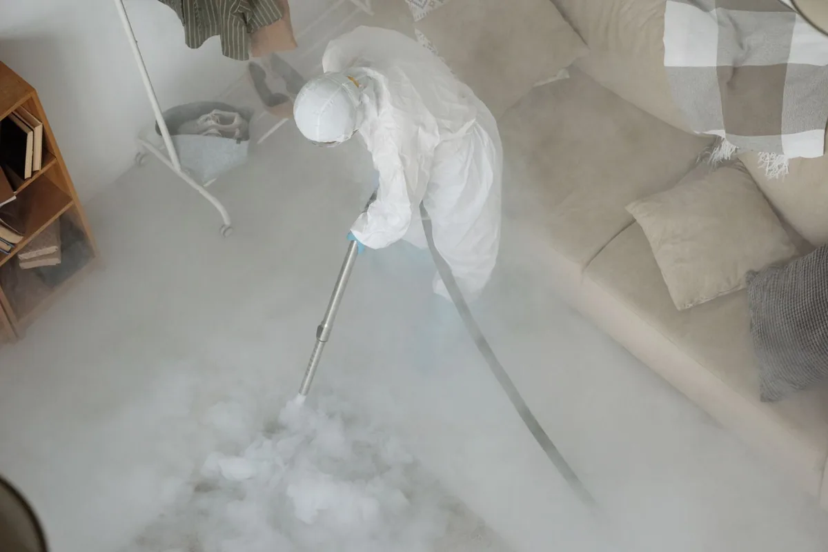 Biohazard cleanup technician in protective equipment, Boring, OR